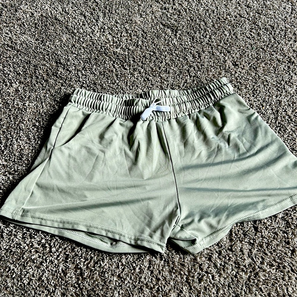 Cute green flimsy ruffle shorts